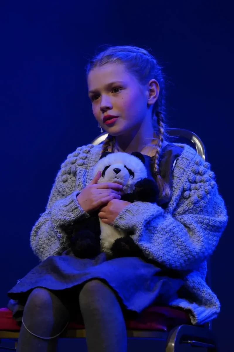Elizabeth performing a vocal number