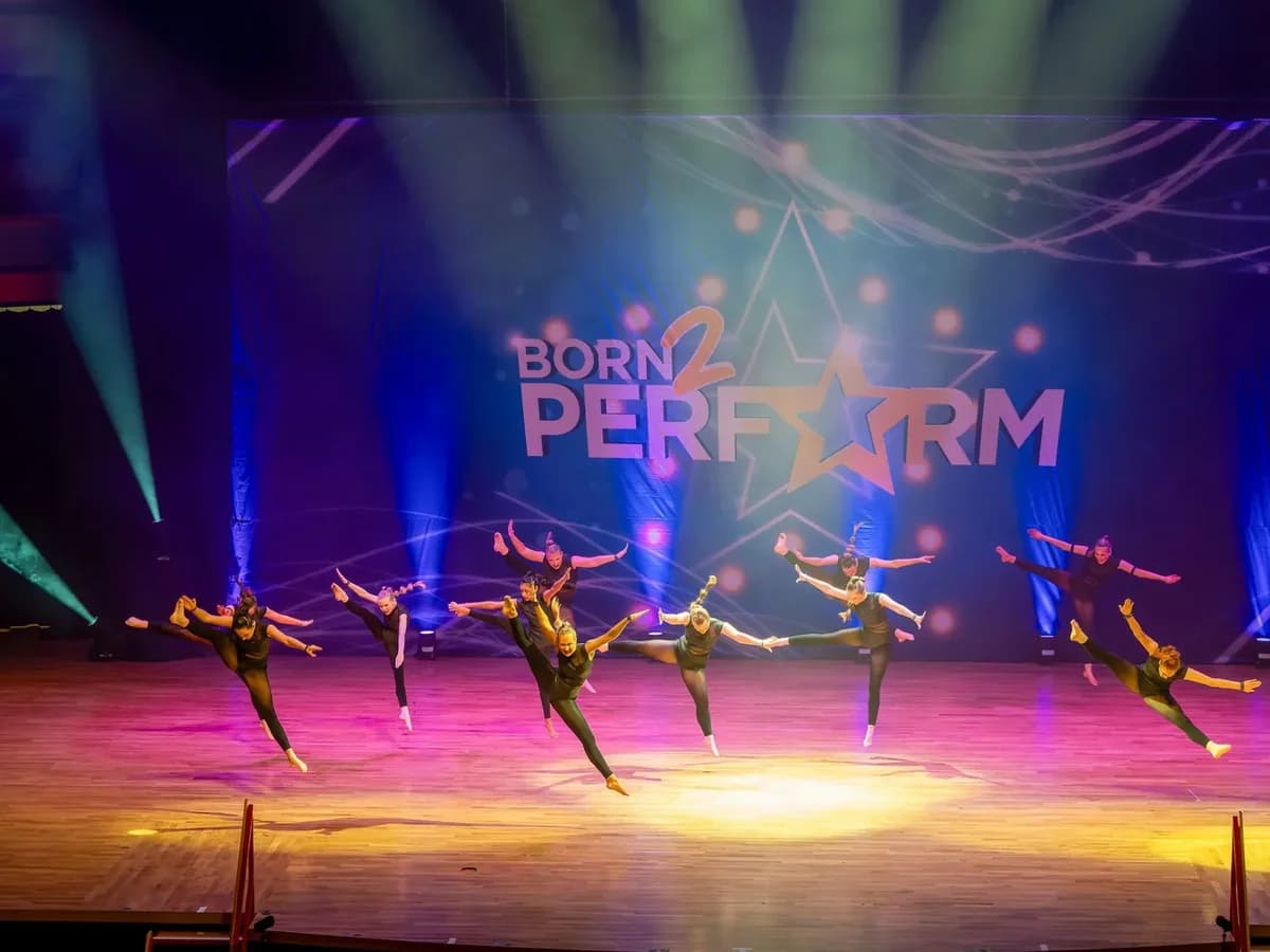 Star-Struck dancer mid-tilt jump at Symphony Hall